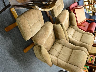 Lot 1175 - Pair of upholstered easy chairs with matching footstools