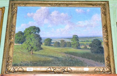 Lot 1200 - Arthur Bateman, an extensive summer landscape, signed and dated (19)57, oil on canvas