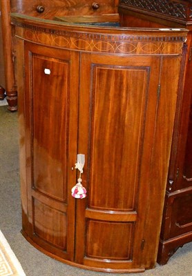 Lot 1279 - A 19th century mahogany inlaid corner cupboard