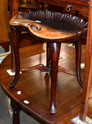 Lot 1282 - A 19th century mahogany shell shaped stool retailed by Greenwood