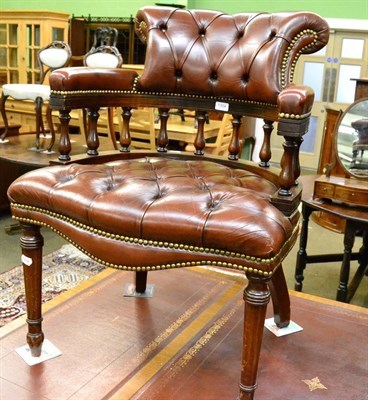 Lot 1304 - Studded leather and mahogany buttoned office chair