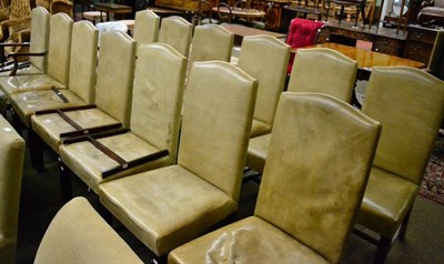 Lot 1317 - A set of sixteen mahogany framed leather dining chairs, including two carvers