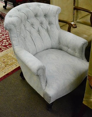 Lot 1318 - A Victorian armchair later recovered in blue floral fabric