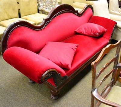 Lot 1321 - Victorian mahogany framed and crimson upholstered serpentine backed sofa