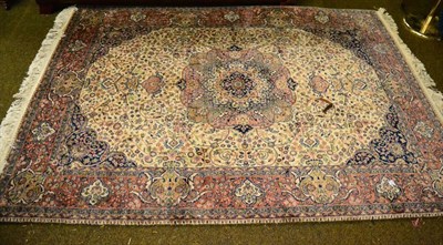 Lot 1326 - A Kashmir rug, North West Indian, the cream field of scrolling vines centred by a cuspid...