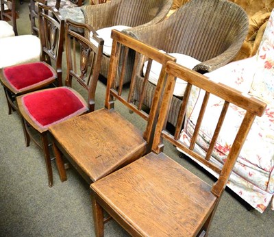 Lot 1334 - A pair of early 19th century oak dining chairs, together with a pair of Edwardian inlaid salon...