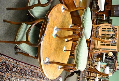 Lot 1347 - A Victorian oval loo table and six chairs