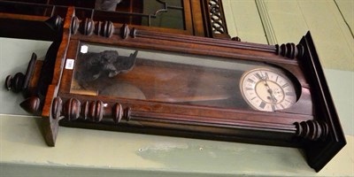 Lot 1365 - A double weight drive Vienna type wall clock