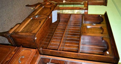 Lot 1367 - An early 20th century oak dresser, the plate rack with integral cornice and central cupboard,...