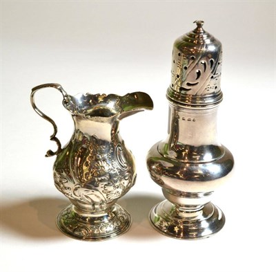 Lot 2 - A silver cream jug and a silver caster