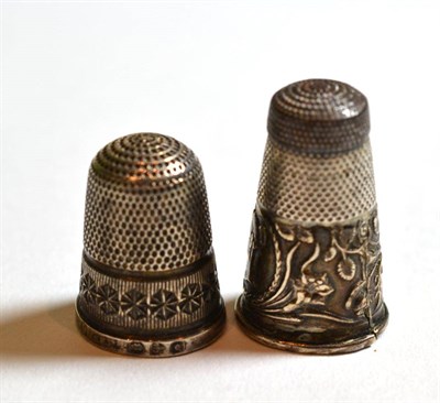 Lot 23 - Victoria & Albert thimble in silver and steel, together with a silver thimble
