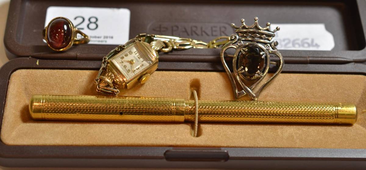 Lot 28 - A 9ct ladies wristwatch, a Swann fountain pen, a dress ring and a silver brooch