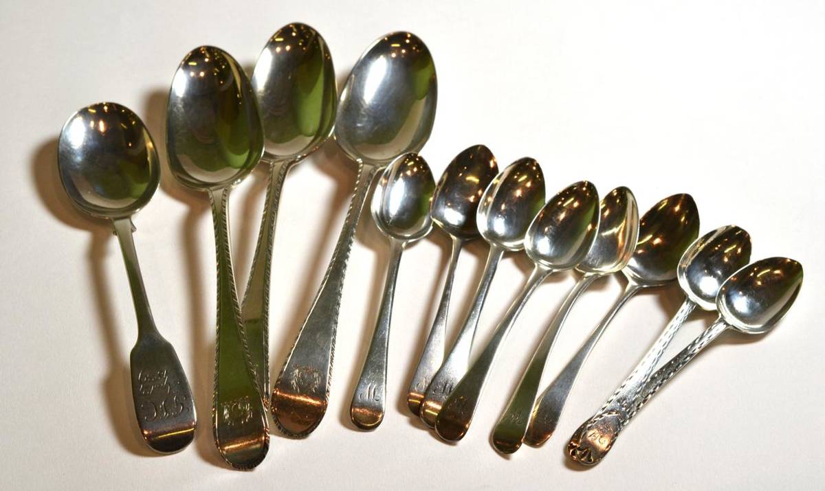 Lot 30 - Three silver George III spoons, eight George III silver teaspoons and another silver spoon