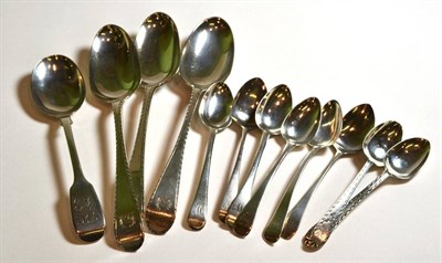 Lot 30 - Three silver George III spoons, eight George III silver teaspoons and another silver spoon