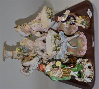 Lot 80 - A porcelain figural candlestick, a Meissen floral encrusted vase and cover (heavily restored)...