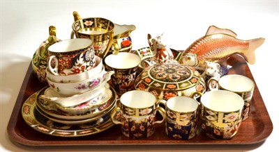 Lot 83 - A tray of Royal Crown Derby including fish paperweight, cups, saucers, milk jug, sugar bowl,...
