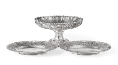 Lot 129 - A Set of Three Victorian Scottish Silver Dishes, Hall & Co, Glasgow 1886, oval and repousse...