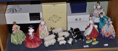 Lot 89 - A shelf of Royal Worcester, Royal Doulton and Coalport figures and Beswick sheep, collie dogs...