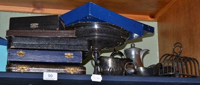 Lot 99 - A shelf of plated ware including cased flatware, tea sets, trays, comports, etc