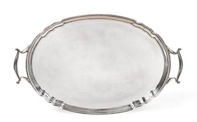 Lot 132 - A Twin-Handled Silver Tray, Roberts & Belk, Sheffield 1927, oval with shaped rim, 52cm wide...