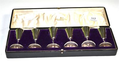 Lot 117 - A set of six silver Walker & Hall stemmed toast cups, Sheffield marks, cased