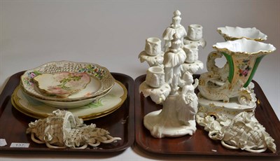 Lot 137 - A pair of porcelain cornucopias, a pair of white glazed twin handled candlesticks, a pair of basket