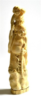 Lot 161 - A Japanese ivory okimono, early 20th century, of Budai standing holding a child on his...