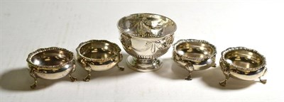 Lot 165 - A set of four Victorian silver salt cellars, London 1890, and a George III silver pedestal...