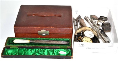 Lot 179 - Silver handled knives, napkin rings, button hooks, loose jet beads, silver pocket watch and a...