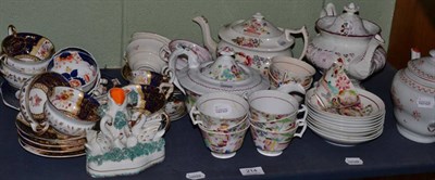 Lot 214 - A collection of 19th century English floral gaudy tea and coffee wares, various makers...