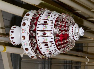 Lot 221 - A Bohemian overlay cranberry and opaque glass light fitting