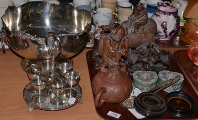 Lot 230 - Chinese wood carvings, plated punch bowl and a cruet set