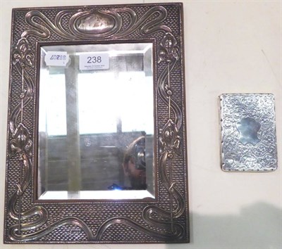 Lot 238 - Edwardian silver photograph frame, together with a silver cigarette case (2)