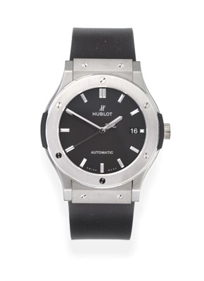 Lot 146 - A Titanium Automatic Calendar Centre Seconds Wristwatch, signed Hublot, model: Classic Fusion, ref
