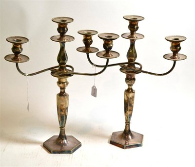 Lot 252 - Pair of plated hexagonal three light candelabra, from Goldsmiths Co Newcastle