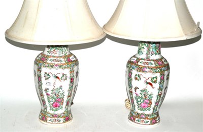 Lot 270 - A pair of Cantonese famille rose table lamps