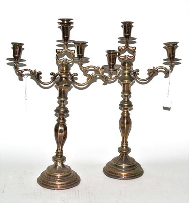 Lot 278 - Pair of plated octagonal candelabra, for three lights