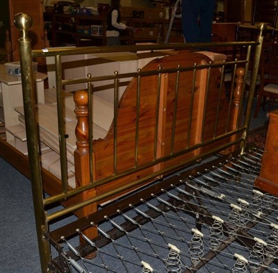 Lot 1024 - A modern brass double bed frame