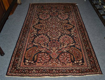 Lot 1026 - Mahal rug West Iran, the mightnight blue field of semi-naturalistic blossoming flowers enclosed...