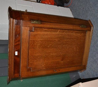 Lot 1030 - A George III oak corner cabinet