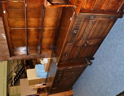 Lot 1063 - Reproduction oak dresser and an oak sideboard