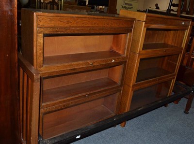 Lot 1068 - Two oak Globe Wernicke type bookcases, two Edwardian chairs and two oak chairs