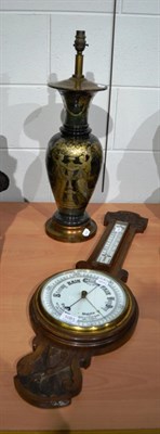 Lot 1081 - Barometer and lamp