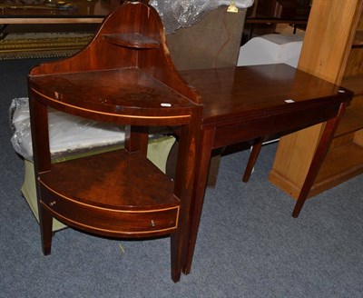 Lot 1111 - A mahogany card table and a corner washstand