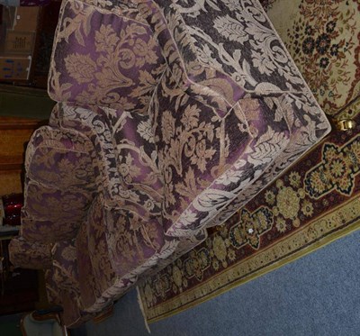 Lot 1118 - A modern three piece suite upholstered in violet