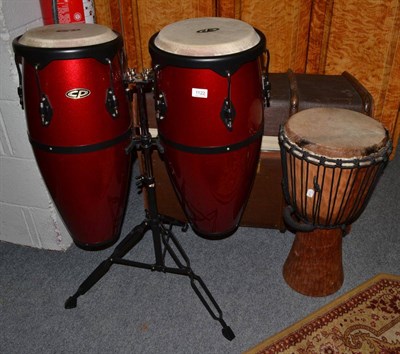 Lot 1122 - Pair of C.P Conga drums and another single drum