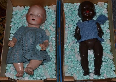 Lot 1148 - Two dolls with rocking eyes, back of the heads stamped A M Germany for Armand Marseille