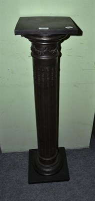 Lot 1177 - A black classical column