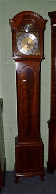 Lot 1181 - A reproduction mahogany small longcase clock