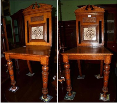 Lot 1190 - A pair of Victorian hall chairs with tiled backs